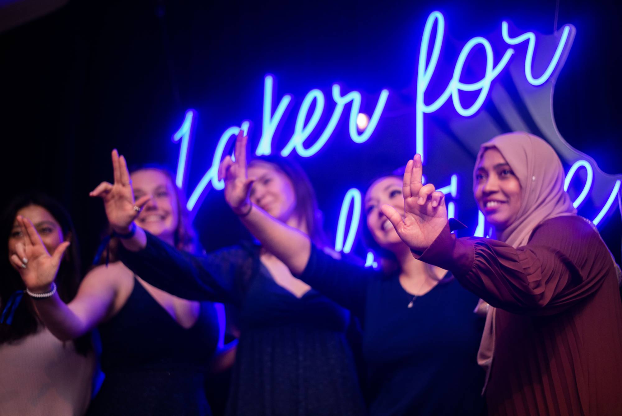 people doing the anchor up sign